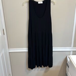 Super cute black dress with tiers below waist